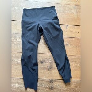 Black lululemon 7/8 leggings with scalloped edge and mesh